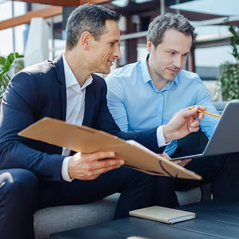 two business men are discussing