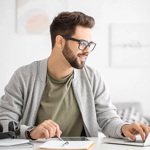 man is working at the computer