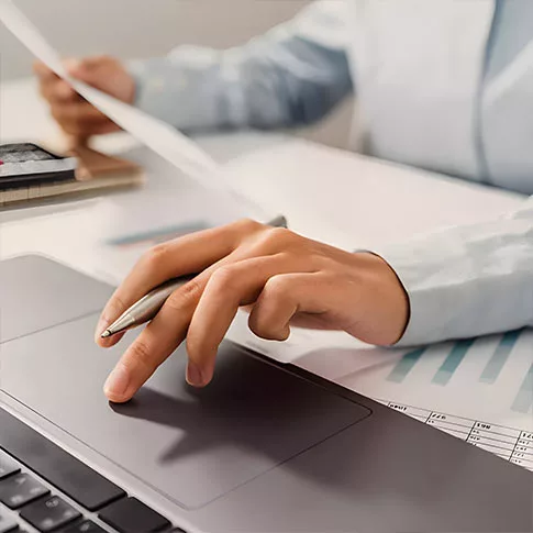 male worker doing tasks on laptop