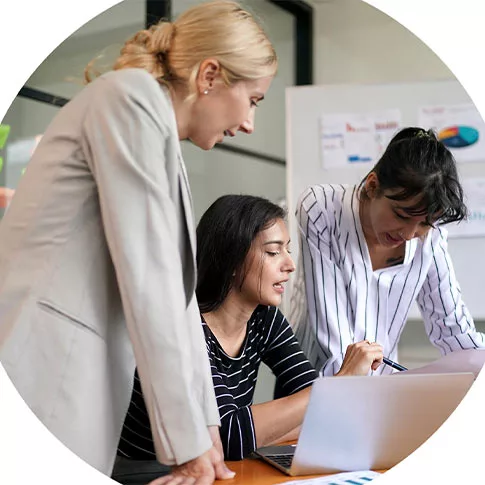 three working women are discussing their work