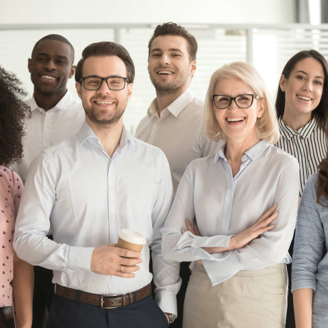 workers taking a group photo at work1 