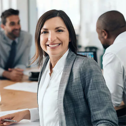 career woman is smiling at the camera